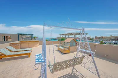 a swing on the roof of a house at SeaView Penthouse with Roof in Marina El Gouna Egypt (Center) in Hurghada