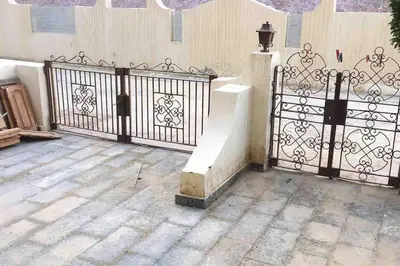 a wrought iron gate in front of a building at Villa 2 apartment 2 village veiw infront of Palma de Meritee in Hurghada