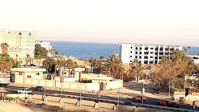a view of a city with buildings and the ocean at AlDau heights Maher in Hurghada