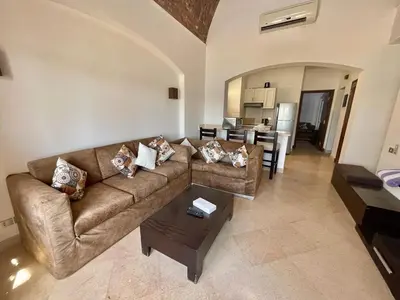 a living room with a couch and a table at EL GOUNA Y 97-1-8 WAST GOLF in Hurghada