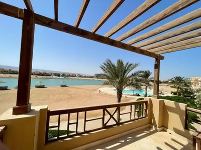 a view of the beach from the balcony of a resort at EL GOUNA Y 97-1-8 WAST GOLF in Hurghada