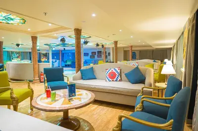a living room with a couch and chairs and a table at 5 Days / 4 Nights Cruise Trip from Luxor to Aswan With all Visits Every Saturday, Monday and Thursday in Luxor