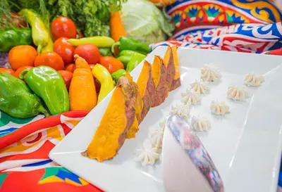 a plate of food with vegetables on a table at 5 Days / 4 Nights Cruise Trip from Luxor to Aswan With all Visits Every Saturday, Monday and Thursday in Luxor