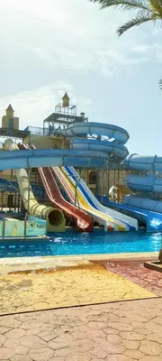 a water slide in a water park at Mirage Aqua Resort 2 Bedroom Apartment in Hurghada
