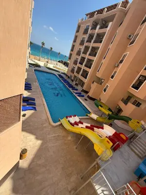 an overhead view of a swimming pool at a resort at Juliana resort beach - Julia apartment in Hurghada