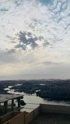 a view of a bridge over a river at king kassem nubian guest house in Aswan