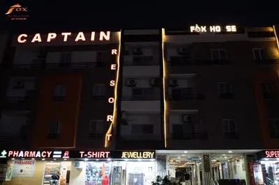 a building with a sign on the side of it at FOX SAHEL AQUA RESORT ELGOUNa& Kite in Hurghada