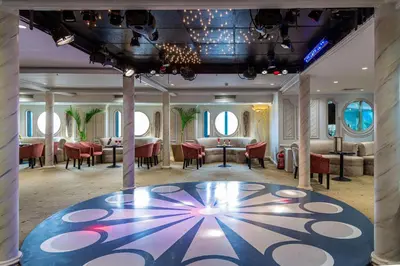 a lobby with a table and chairs in a room at Sonesta Moon Goddess Cruise Ship From Luxor to Aswan - 04 & 07 nights Every Monday in Luxor