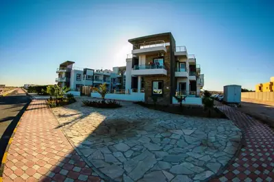 a building on the side of a road at Inter Prime apartment 3 in Hurghada