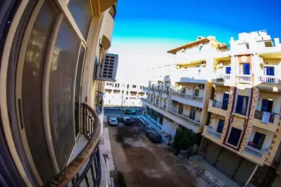 a view from a balcony of two buildings at Inter Prime apartment 2 in Hurghada