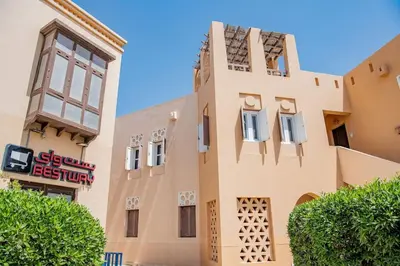 a building with a sign on the side of it at 1-Bedroom Apartment in Abu Tig Marina + Roof Top in Hurghada