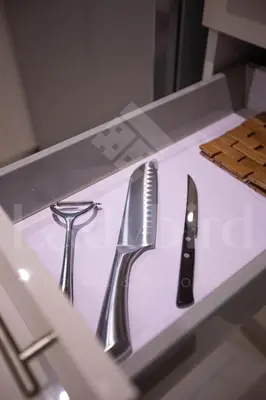 a knife and scissors sitting on a counter next to a knife at Ladybird - Veranda Skyline in Hurghada