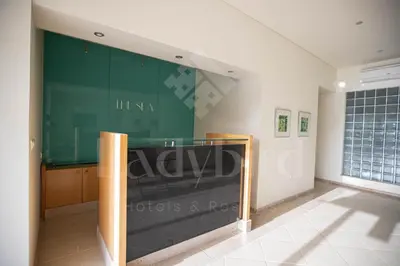 a class room with a green chalkboard on the wall at Ladybird - Veranda Skyline in Hurghada