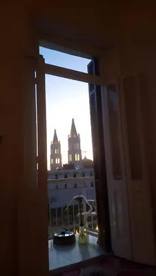 an open window with a view of a building at Alam B&B Luxor in Luxor