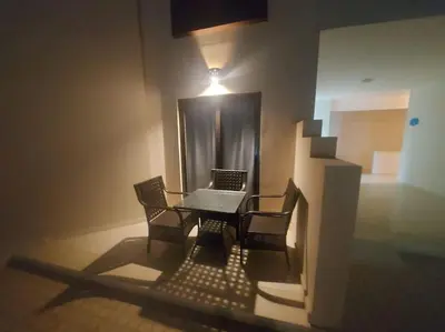 a model of a room with a table and chairs at Studiowohnung auf Poolebene in Hurghada