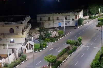 an aerial view of a street at night at Elminaa Residents 2 in Luxor