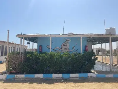 a building with a painting of an octopus on it at Ziena marvel camp in Quseir