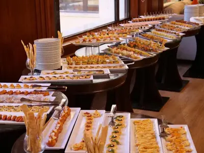 a buffet line with many different types of food at Apartment with services Stella Beach Resort 5 star Makadi bay Egypt in Hurghada