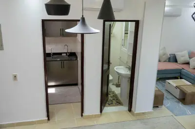 a living room with a sink and a mirror at Beautiful 2-Bed Villa in Makadi Heights in Hurghada