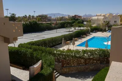 a view of a resort with a swimming pool at Beautiful 2-Bed Villa in Makadi Heights in Hurghada