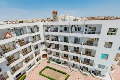 an overhead view of a white apartment building at Family-friendly apartments in Hurghada in Hurghada