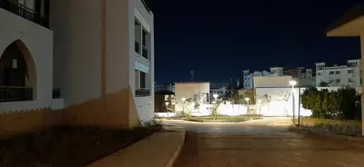 an empty street in a city at night at Hurghada Aldau Heights Studio in Hurghada