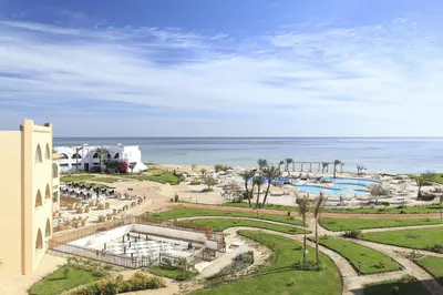 an aerial view of the resort and the ocean at Three Corners Equinox Beach Resort in Abu Dabab