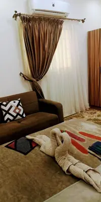 a snakes rug on the floor in a living room at Relax Home 1 in Hurghada
