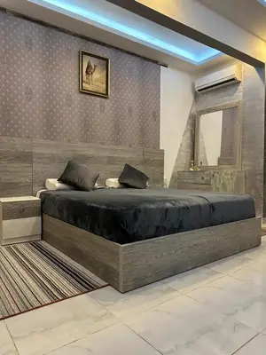 a bedroom with a large bed in a room at Horizon on Mamsha 2 in Hurghada