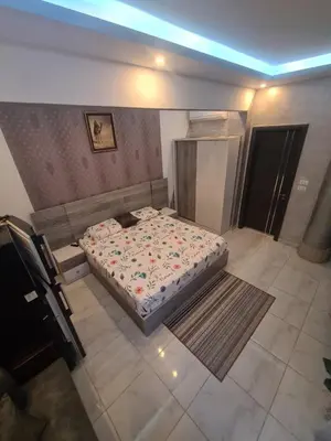 an overhead view of a bedroom with a bed at Horizon on Mamsha 2 in Hurghada