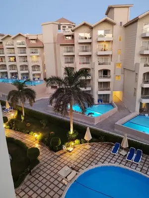an overhead view of an apartment complex with two pools at Velký apartmán 50 m od pláže s přístupem zdarma- Sahl Hasheesh Hurghada resort Andalusie in Hurghada
