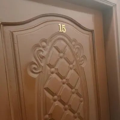 a door with a clock on top of it at Oscar luxury free WiFi 15 in Hurghada