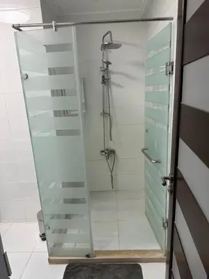 a shower with a glass door in a bathroom at S 22 Marina City in Port Ghalib