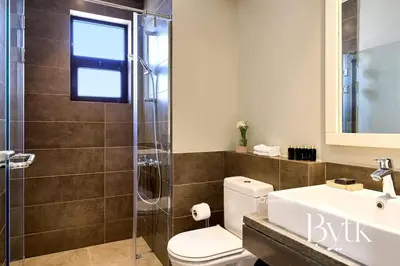 a bathroom with a toilet and a shower and a sink at BYTK - Casamigos in Hurghada