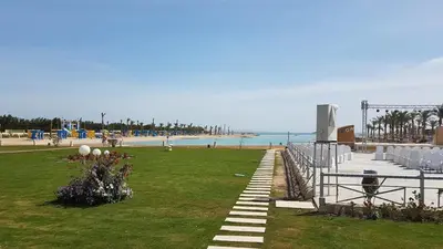 a park with a beach and the ocean in the background at Private Room Hurghada for rent beach and pools included Not Valid for Locals in Hurghada