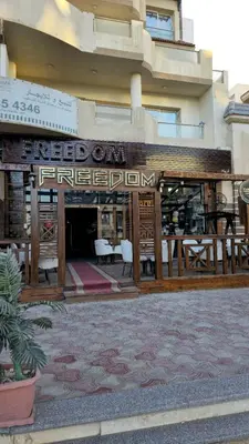 a building with a sign that reads fire department at Florenza Khamsin Apartments in Hurghada