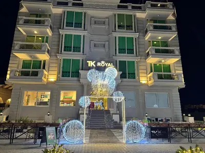 a building with a staircase in front of it at TK Royal & Spa in Hurghada