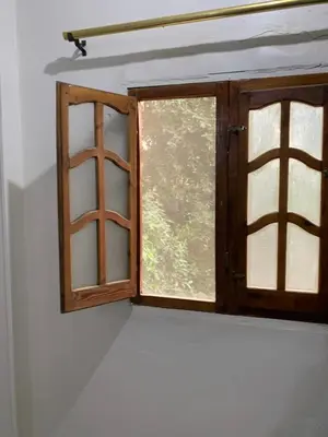 an open window in a white room with at Welcome to LLL (Love Life Luxor) in Luxor