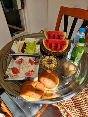a table with a tray of food on top at Casa Helvetica in Luxor