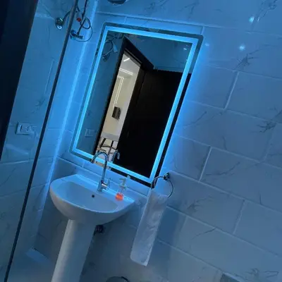 a bathroom with a sink and a mirror at منتجع جوليانا بيتش ريزورت in Hurghada