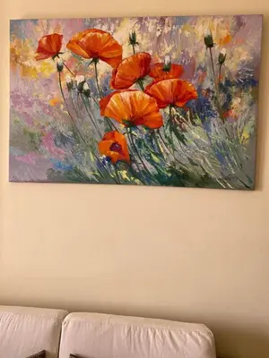 a painting of red poppies on a wall at Gravity Beach Apartment Non Egyptians only in Hurghada