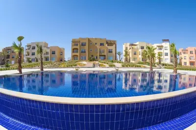 a large swimming pool in front of some buildings at El-Gouna Water-Side Apartment in Hurghada