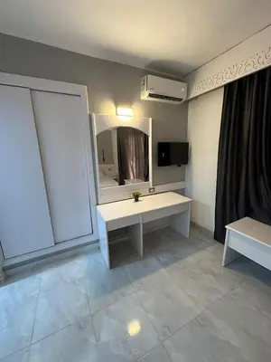 a bathroom with a sink and a mirror at Elixir in Hurghada