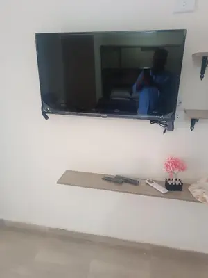 a mirror on a wall with a person taking a picture at Princess resort flat no217 in Hurghada