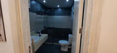 a bathroom with a sink and a toilet at Fanadir Bay in Hurghada