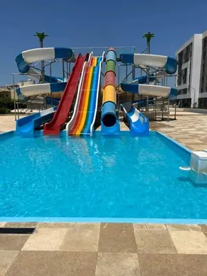 a water slide in a swimming pool at Fanadir Bay in Hurghada