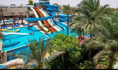 a large water park with a water slide at Elegant 2-Bedroom Suite Mirage Bay in Hurghada