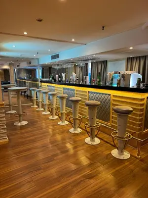 a row of bar stools in a restaurant at Orient Tower Prestige Nile Cruise-Every Monday from Luxor for 04 & 07 Nights - Every Friday From Aswan for 03 Nights in Luxor