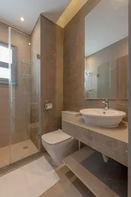 a bathroom with a toilet and a sink and a shower at Luxury Villa with private pool Sholan 2 in Hurghada