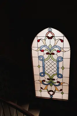 a stained glass window with the letter j on it at Villa Barba Luxor in Luxor